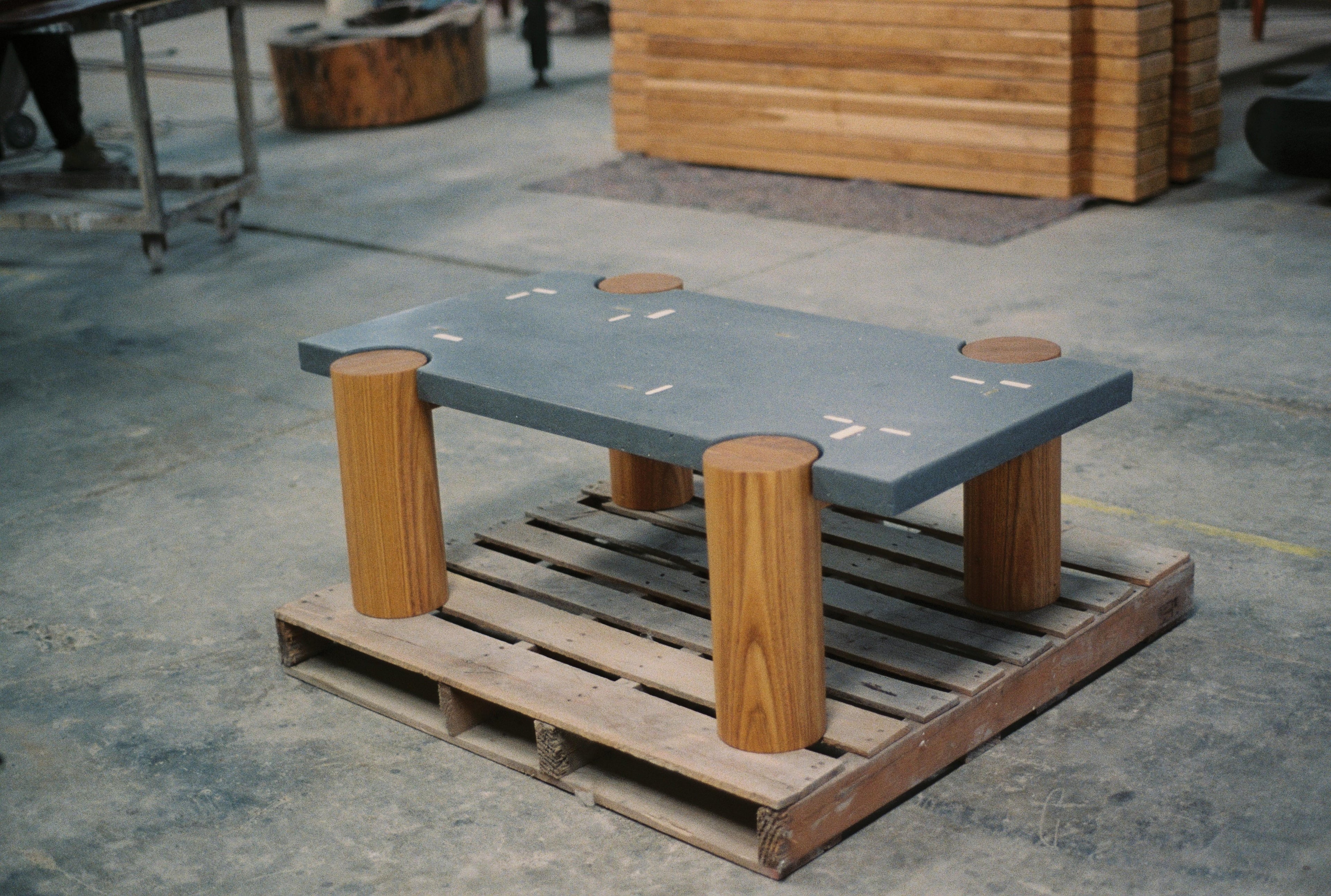 https://a.1stdibscdn.com/cacique-coffee-table-in-cast-concrete-with-bronze-inlays-and-solid-oak-legs-for-sale-picture-9/f_108882/f_491925621773324774360/000059_master.JPG