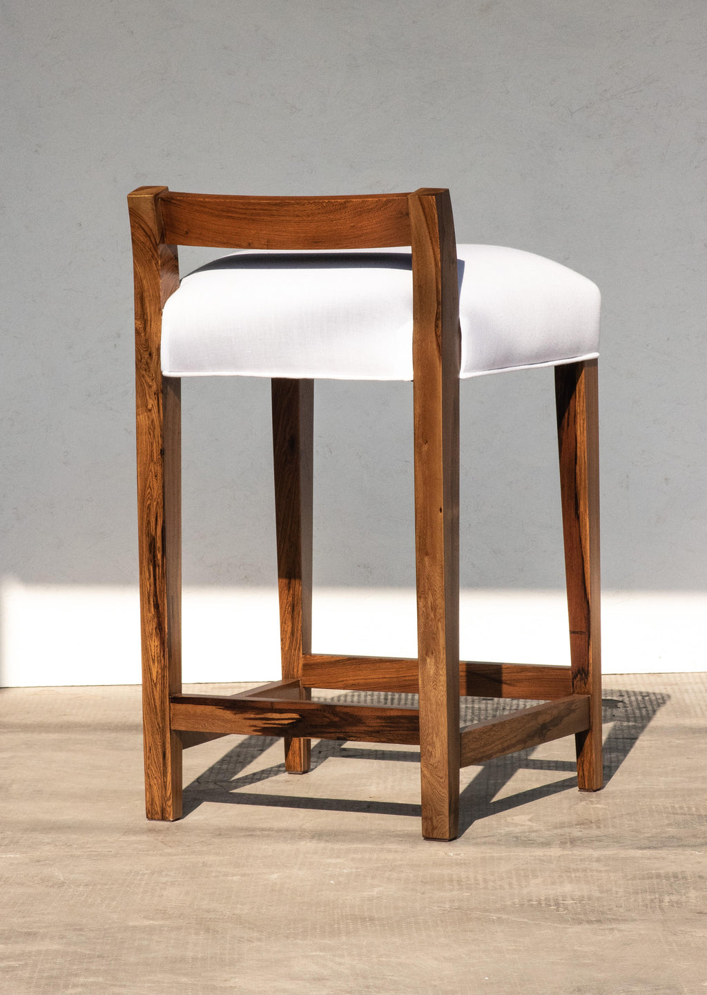 https://a.1stdibscdn.com/set-of-8-exotic-argentine-rosewood-counter-stools-from-costantini-umberto-for-sale-picture-7/f_25173/f_362625121695304298812/005_Umberto_Counter_Stool_from_Costantini_master.jpg