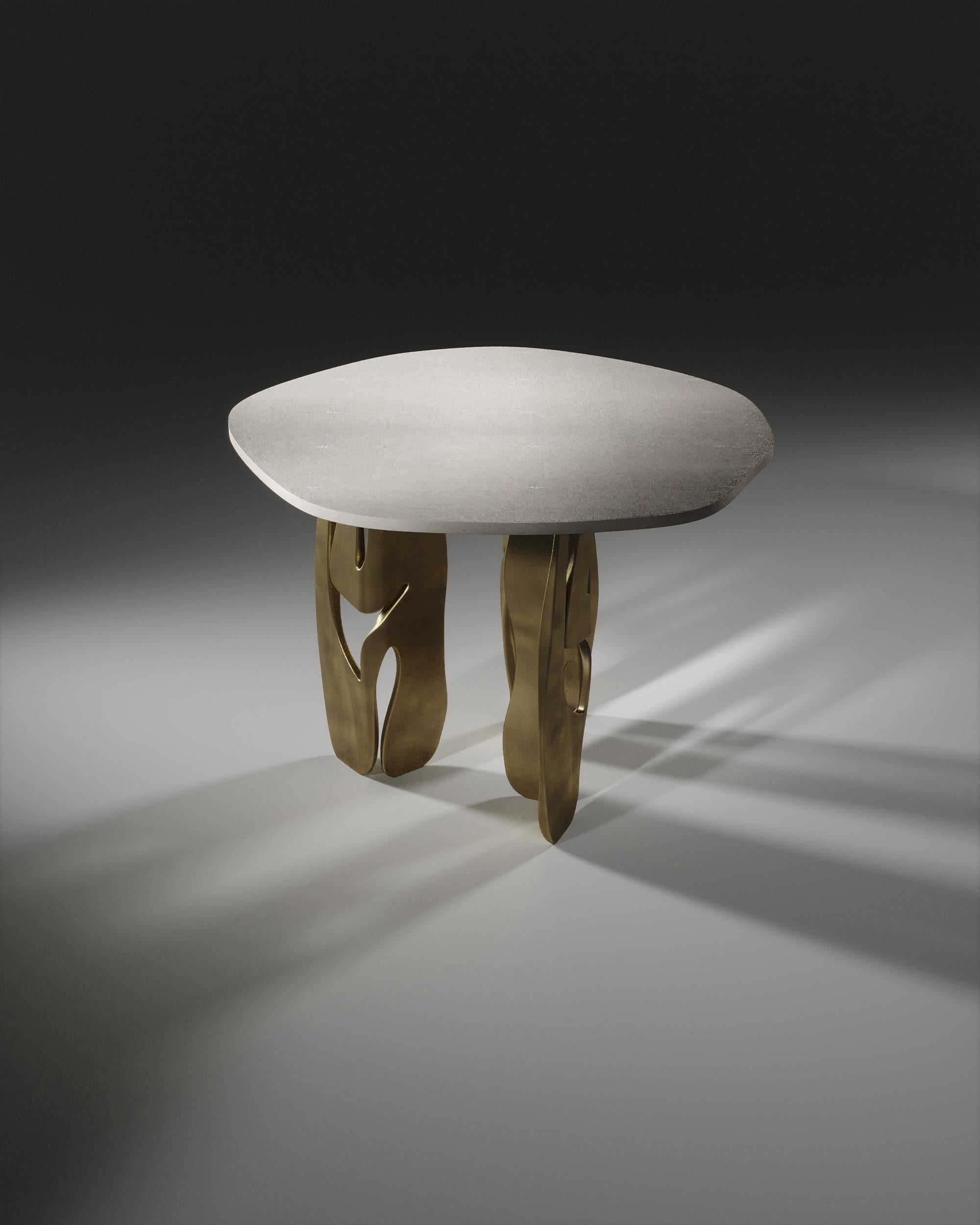 https://a.1stdibscdn.com/shagreen-breakfast-table-with-sculptural-brass-legs-by-r-y-augousti-for-sale-picture-9/f_45491/f_468498521759134736116/00_Interactive_LightMix_18_TABLE_3_A930018_master.jpg