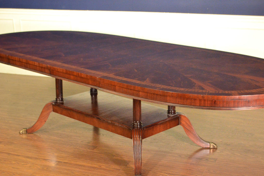 https://a.1stdibscdn.com/oval-mahogany-regency-style-dining-table-by-leighton-hall-for-sale-picture-2/f_44162/f_135373021549134138990/012_master.JPG