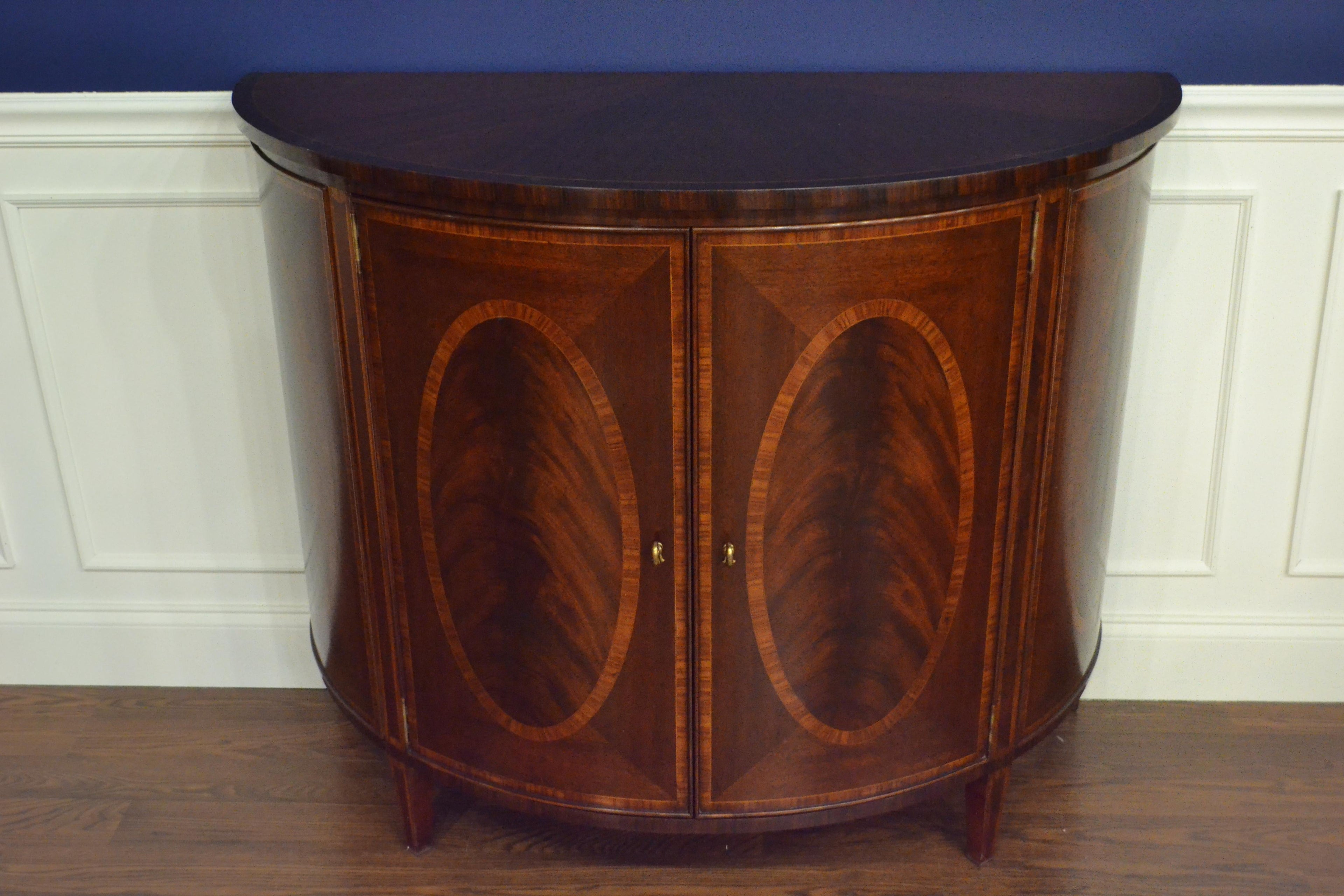 https://a.1stdibscdn.com/hepplewhite-style-mahogany-demilune-cabinet-by-leighton-hall-for-sale-picture-3/f_44162/f_154696221563149482917/01A8FEF9_3CC2_43AB_AF2B_B29E3ADE991A_master.jpeg