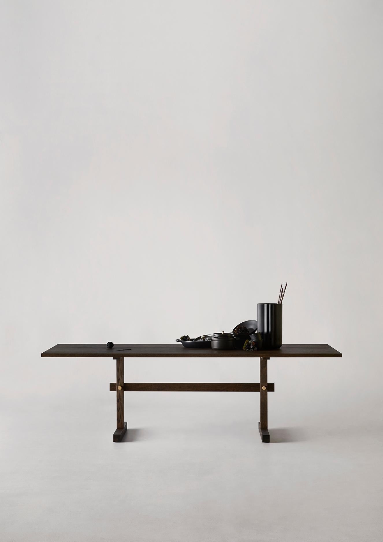 https://a.1stdibscdn.com/gaspard-dark-oak-and-brass-dining-table-240-by-eberhart-furniture-for-sale-picture-2/f_12192/f_478585621764950024111/01_6584_master.jpg