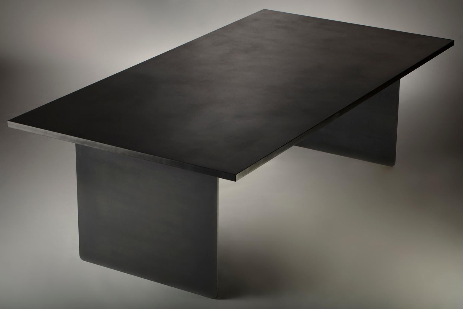 https://a.1stdibscdn.com/large-deep-black-steel-dining-table-for-sale-picture-2/f_53662/f_199464821595361477487/01_APD_Marianas_Table_003_1__master.jpg