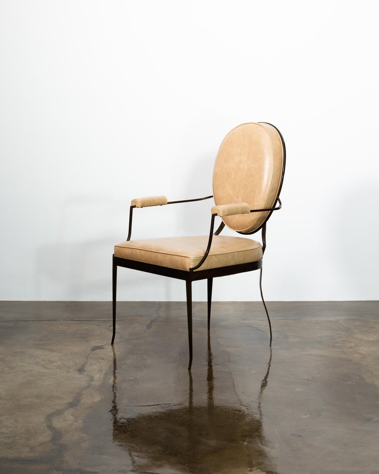 https://a.1stdibscdn.com/hand-forged-iron-and-leather-chair-in-the-of-style-andre-arbus-by-costantini-for-sale-picture-2/f_25173/f_250817421631198501624/01_Andre_Forged_Iron_and_Leather_Dining_Chair_from_Costantini_Design_master.jpg?width=768