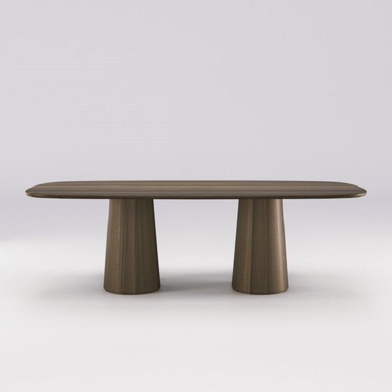 https://a.1stdibscdn.com/rectangular-dining-table-with-rounded-edges-in-oak-or-walnut-for-sale-picture-5/f_27693/f_381684521706613368285/01_FRONT_WALNUT_M_master.jpg