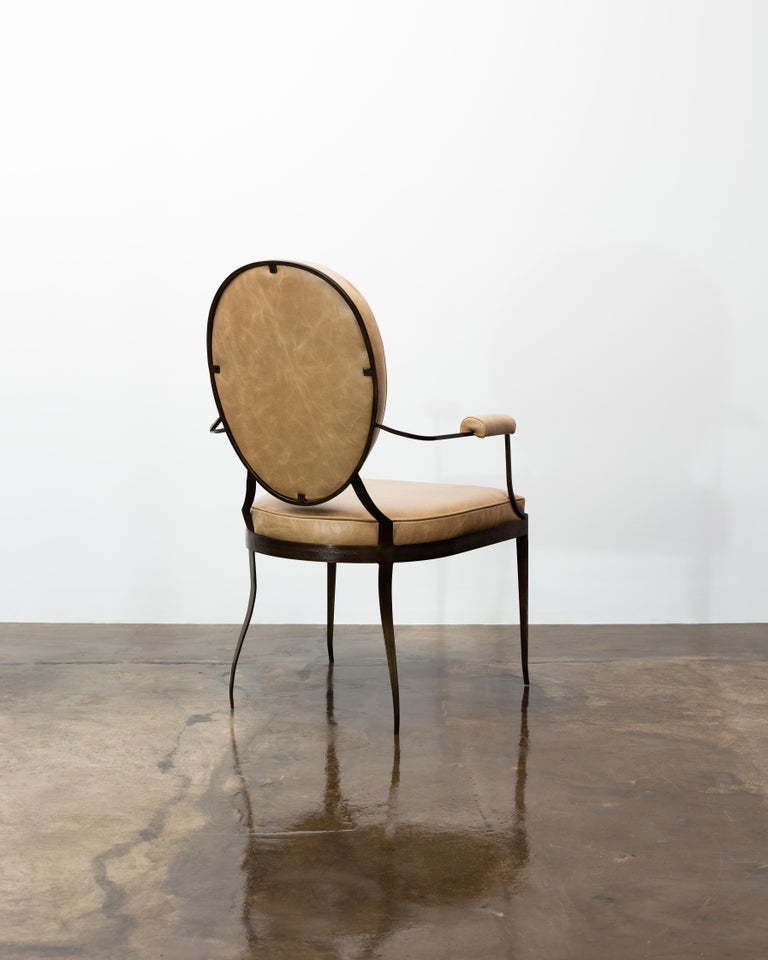 https://a.1stdibscdn.com/hand-forged-iron-and-leather-chair-in-the-of-style-andre-arbus-by-costantini-for-sale-picture-3/f_25173/f_250817421630082159249/02_Andre_Forged_Iron_and_Leather_Dining_Chair_from_Costantini_Design_master.jpg?width=768