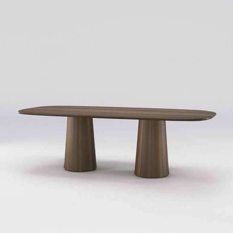 https://a.1stdibscdn.com/rectangular-dining-table-with-rounded-edges-in-oak-or-walnut-for-sale-picture-6/f_27693/f_381684521706613362122/02_PERSP_WALNUT_M_master.jpg