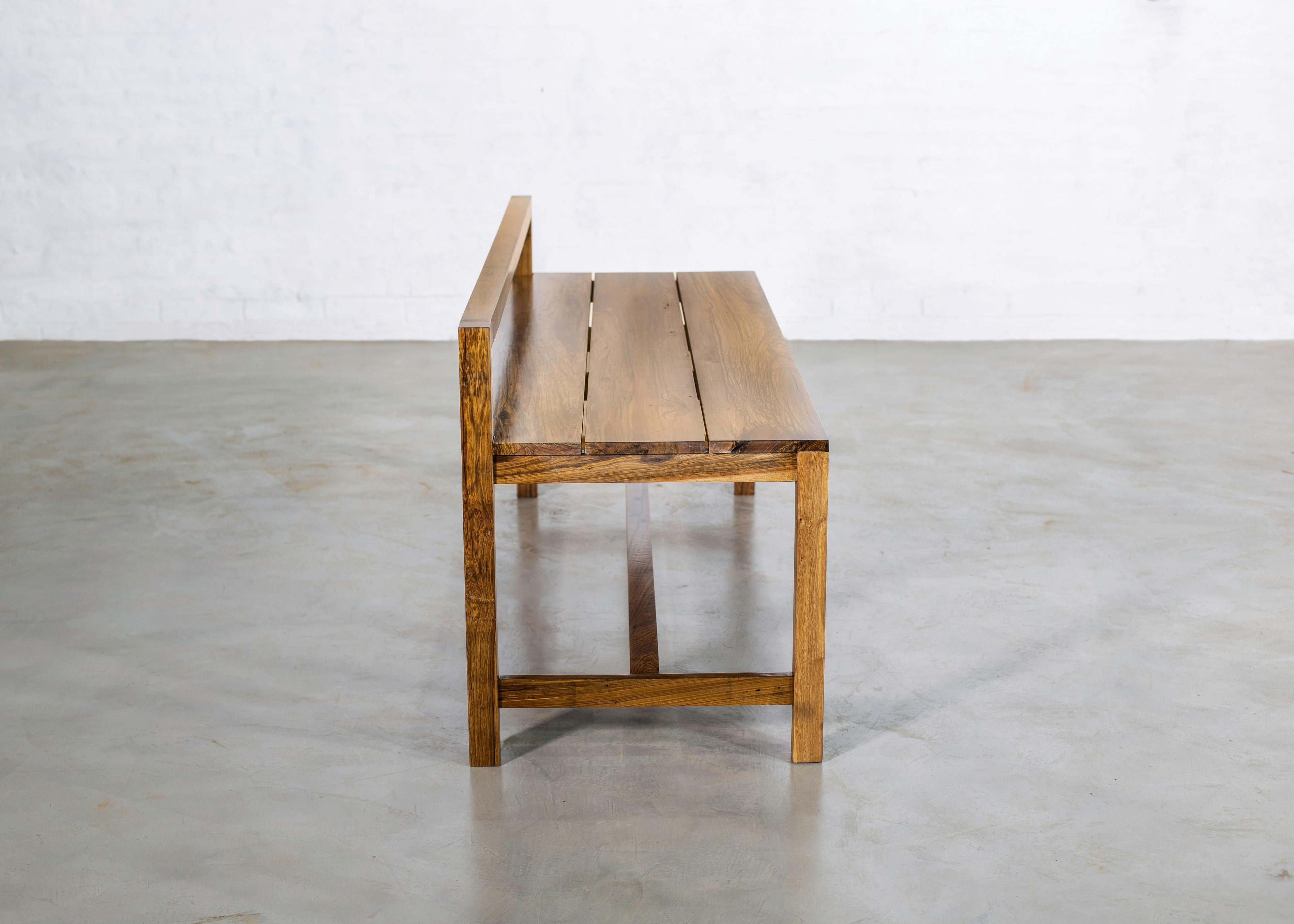 https://a.1stdibscdn.com/modern-solid-argentine-rosewood-outdoor-bench-from-costantini-serrano-for-sale-picture-3/f_25173/1618414029943/04_Serrano_Bench_from_Constantini_master.jpg