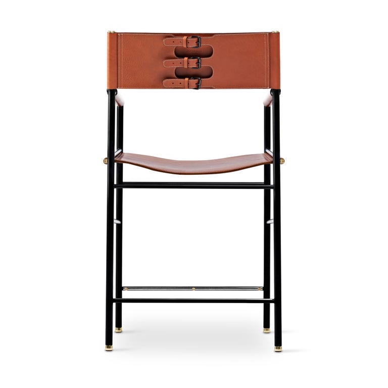 https://a.1stdibscdn.com/set-of-5-repose-counter-stool-w-backrest-natural-tan-saddle-black-rubbered-metal-for-sale-picture-4/f_40561/f_303545021662719551184/04_jovervalls_repose_Taburete_bajo_respaldo_naturaltobacco_blackpowder_master.jpg?width=768