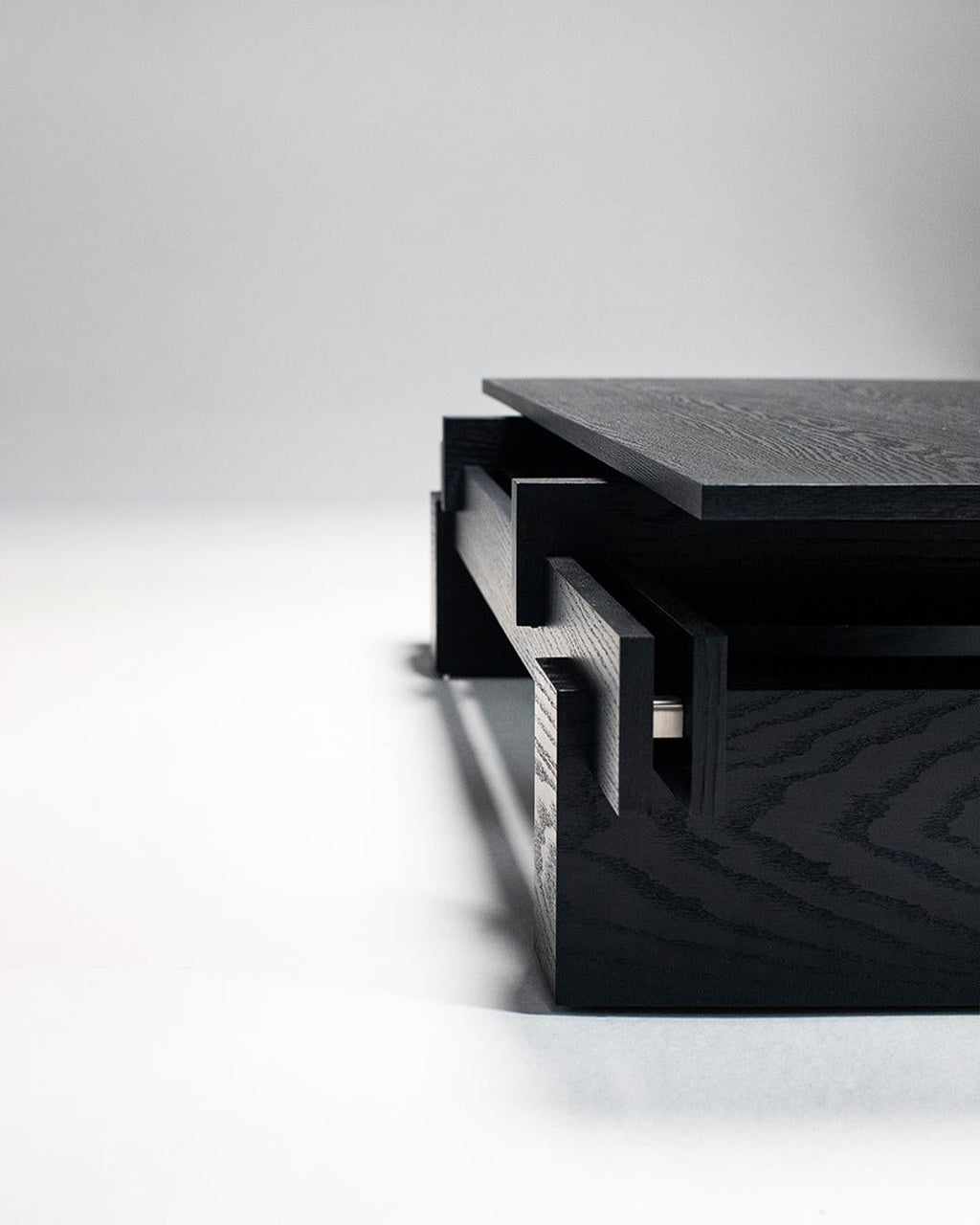 https://a.1stdibscdn.com/slit-coffee-table-wood-top-with-dynamic-look-black-oak-for-sale-picture-4/f_68572/f_366461421744888653514/04_master.jpg