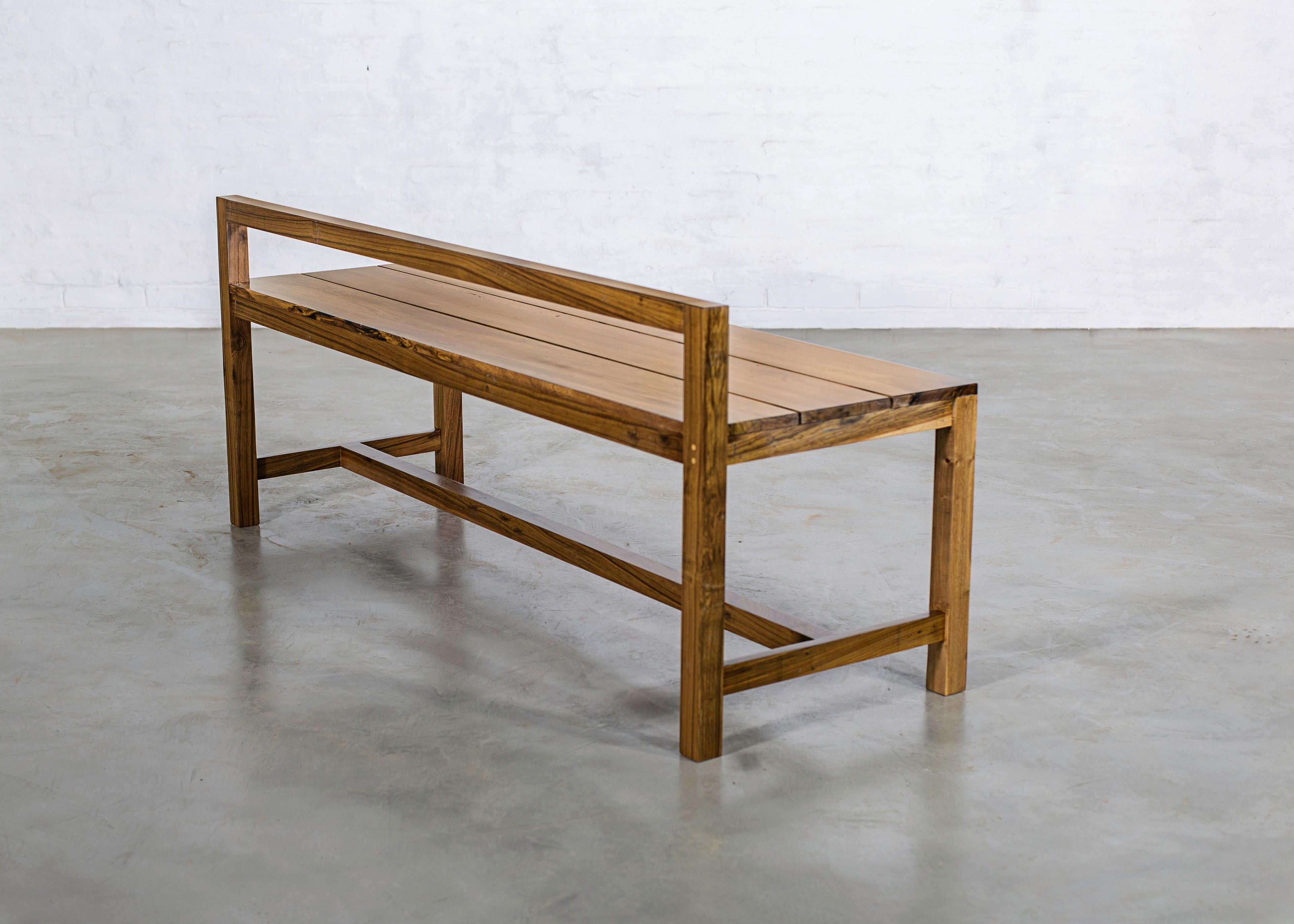 https://a.1stdibscdn.com/modern-solid-argentine-rosewood-outdoor-bench-from-costantini-serrano-for-sale-picture-4/f_25173/1618414024947/05_Serrano_Bench_from_Costantini_master.jpg