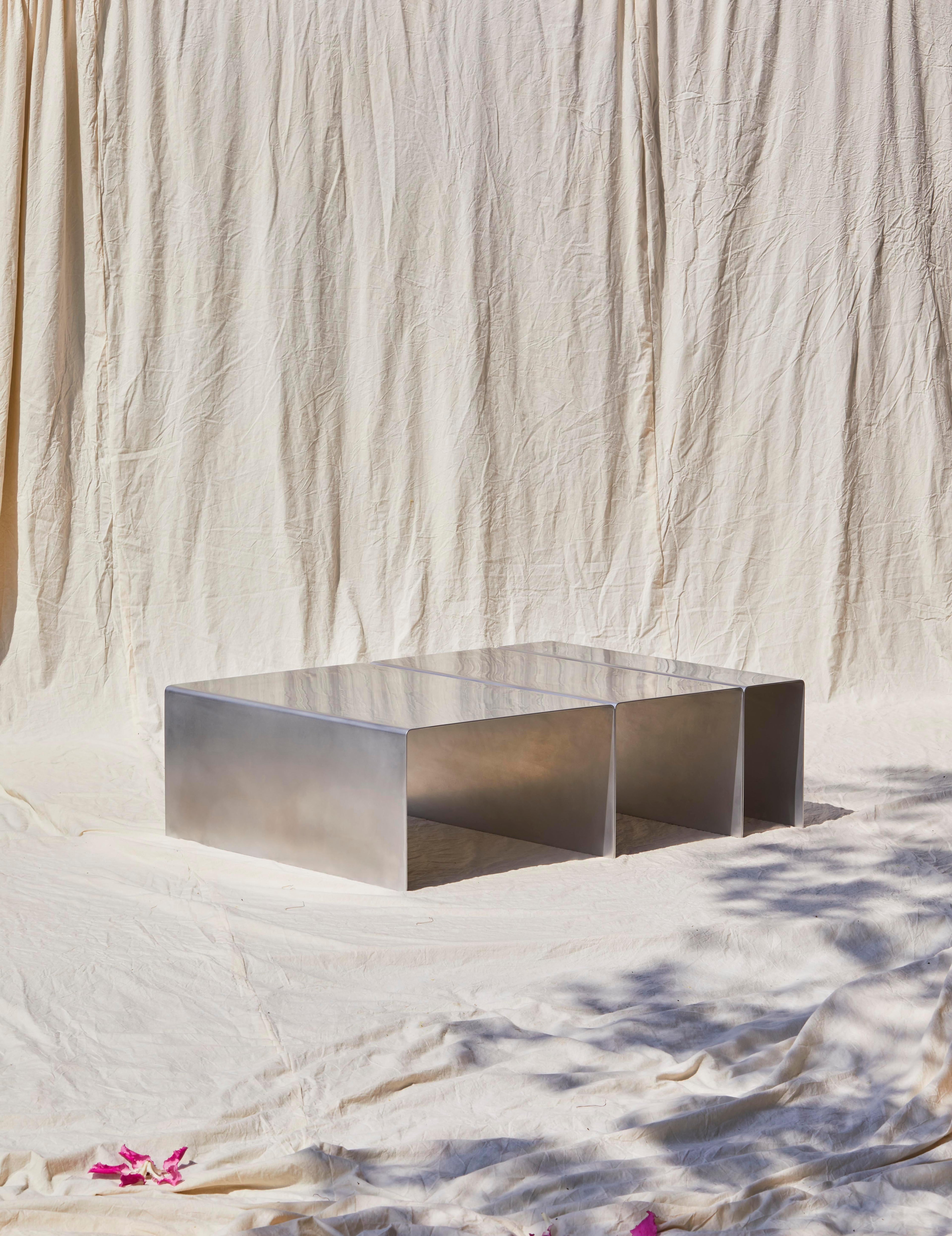 https://a.1stdibscdn.com/segment-coffee-table-contemporary-waxed-aluminum-table-by-estudio-persona-for-sale-picture-3/f_23783/1550874596939/092418_EstudioPersona6051_master.jpg