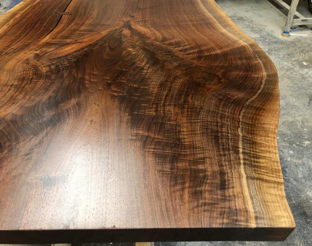 https://a.1stdibscdn.com/walnut-slab-live-edge-dining-table-custom-made-by-petersen-antiques-for-sale-picture-9/f_8065/1597847489800/0AAAE7BC_DA71_451C_8486_BC70F6CAB1D3_master.jpeg