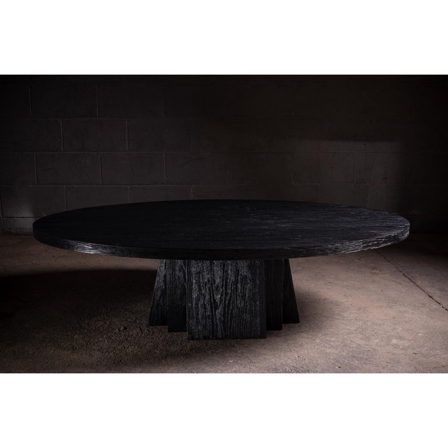 https://a.1stdibscdn.com/daido-oval-coffee-table-in-solid-black-oak-by-no-age-studio-for-sale-picture-2/f_12192/f_477211521764171011963/0B5A9513_master.jpg