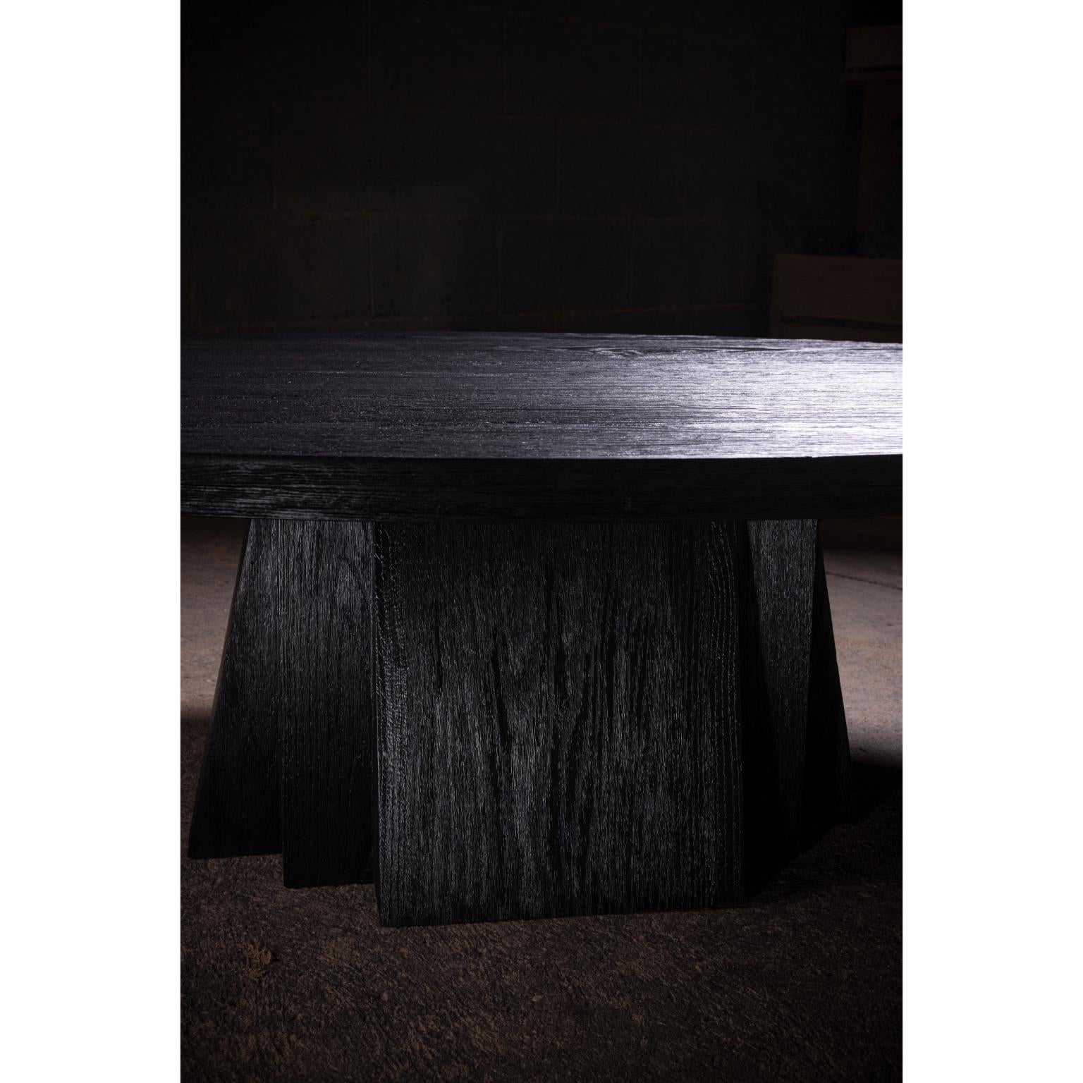https://a.1stdibscdn.com/daido-oval-coffee-table-in-solid-black-oak-by-no-age-studio-for-sale-picture-3/f_12192/f_477211521764171012009/0B5A9525_master.jpg