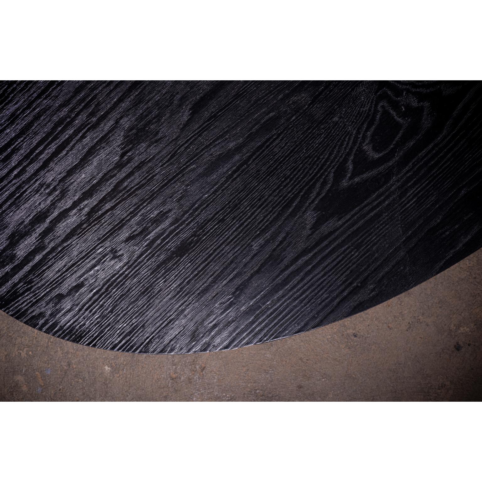 https://a.1stdibscdn.com/daido-oval-coffee-table-in-solid-black-oak-by-no-age-studio-for-sale-picture-5/f_12192/f_477211521764171012159/0B5A9531_master.jpg