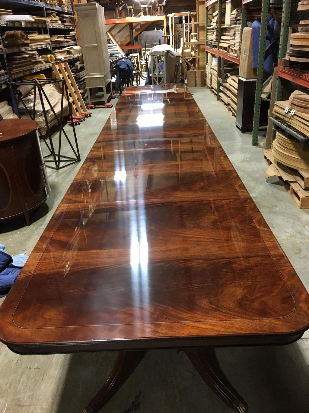 https://a.1stdibscdn.com/large-24-ft-custom-mahogany-georgian-style-dining-table-by-leighton-hall-for-sale-picture-4/f_44162/f_135312021549039098497/0CAD5525_DC4E_4F3E_A429_422EB542E47C_master.jpeg