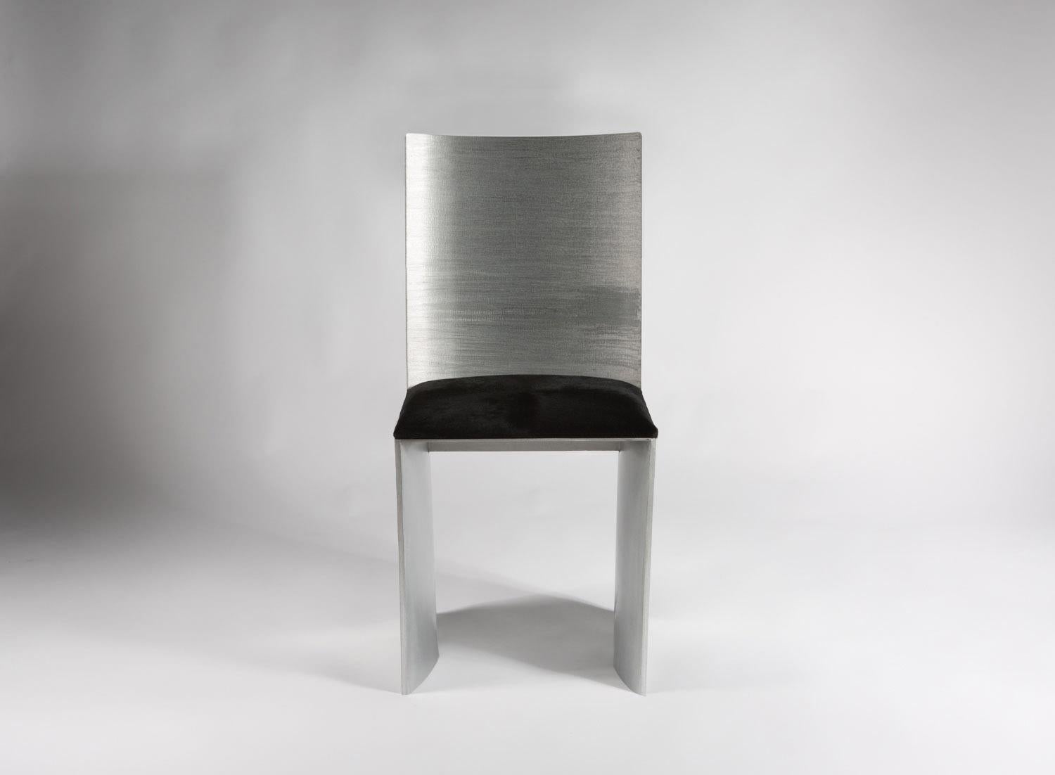 https://a.1stdibscdn.com/isu-highback-textured-metal-chair-by-soraya-osorio-for-sale-picture-6/f_31433/f_92791031713296684453/0O5A8136_HIGHBACK_master.jpg