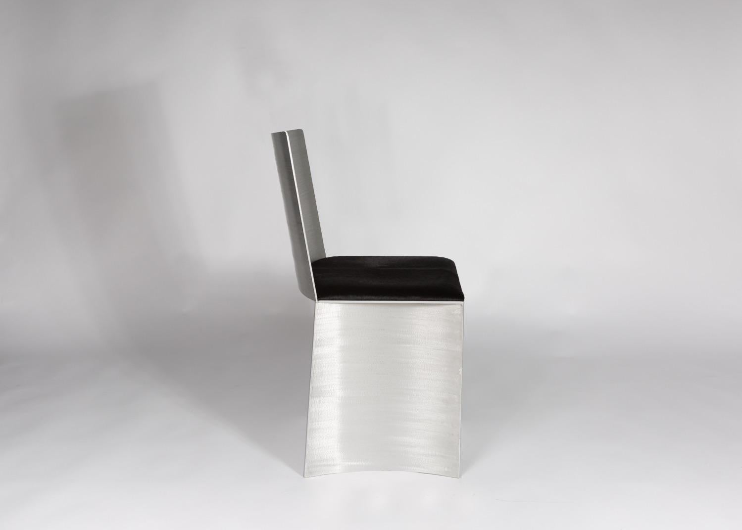 https://a.1stdibscdn.com/isu-lowback-textured-satin-metal-chair-by-soraya-osorio-for-sale-picture-2/f_31433/f_392989521713363439518/0O5A8151_LOWBACK_master.jpg