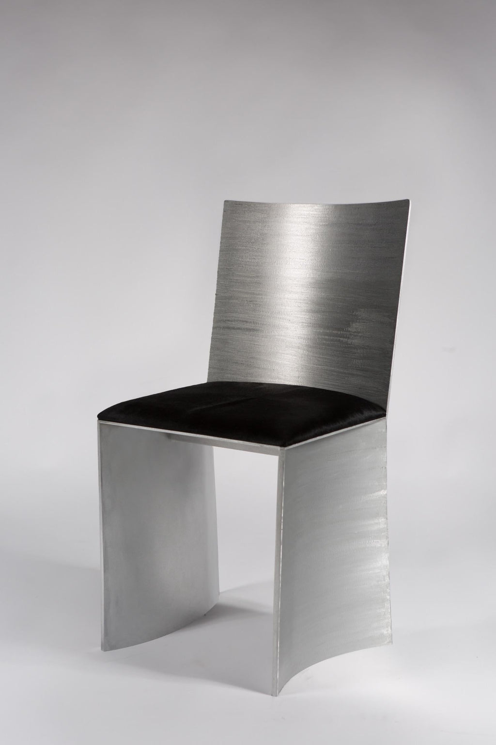 https://a.1stdibscdn.com/isu-lowback-textured-satin-metal-chair-by-soraya-osorio-for-sale-picture-4/f_31433/f_392989521713366013207/0O5A8170_LOWBACK_master.jpg