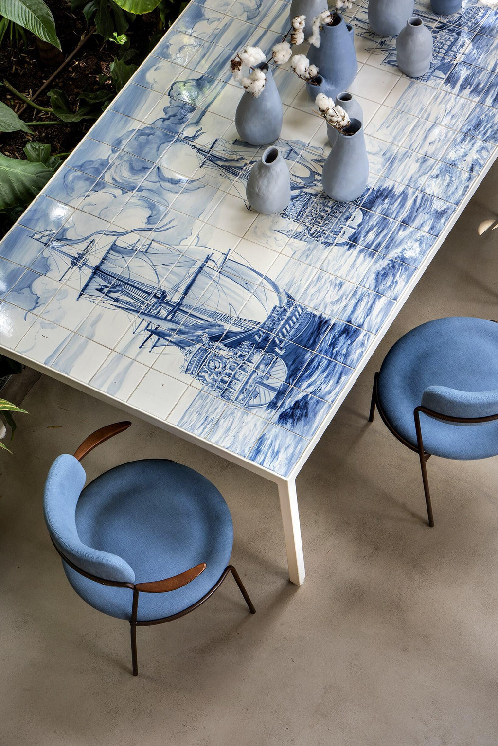 https://a.1stdibscdn.com/mesa-portuguesa-com-certeza-by-marcio-kogan-hand-painted-tile-metal-table-for-sale-picture-3/f_104502/f_451537321748008044396/0e99cf94_7028_4151_8a9f_66b313c116a0_master.jpg