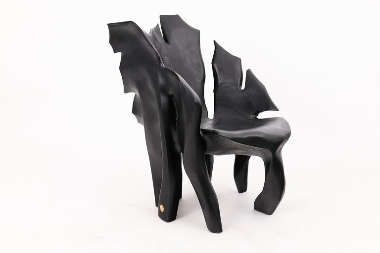 https://a.1stdibscdn.com/sculptural-black-charred-wood-armchair-in-organic-form-by-logniture-for-sale-picture-18/f_80402/f_452624321748697080797/_1003891_master.jpg?width=768