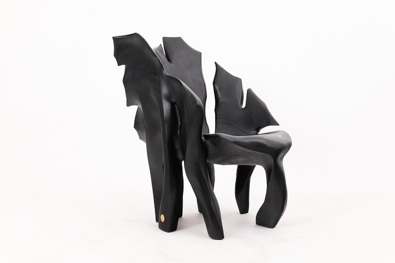 https://a.1stdibscdn.com/sculptural-black-charred-wood-armchair-in-organic-form-by-logniture-for-sale-picture-19/f_80402/f_452624321748697080921/_1003892_master.jpg?width=768