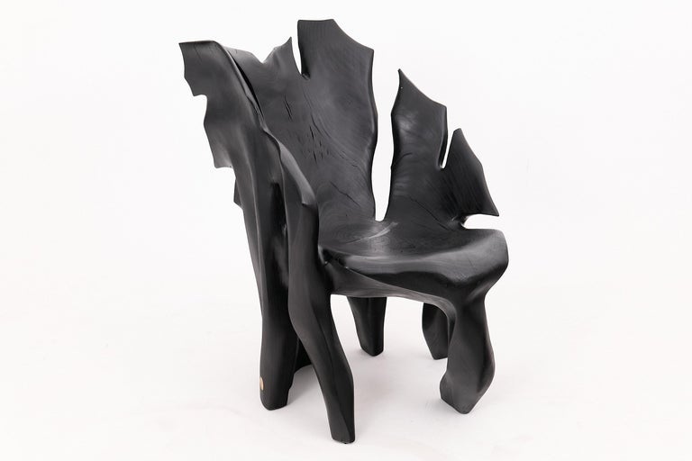 https://a.1stdibscdn.com/sculptural-black-charred-wood-armchair-in-organic-form-by-logniture-for-sale-picture-20/f_80402/f_452624321748697081729/_1003894_master.jpg?width=768