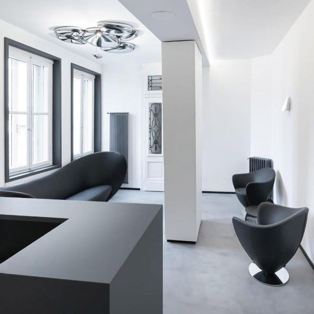https://a.1stdibscdn.com/contemporary-swivel-armchair-with-curved-lines-and-metal-base-for-sale-picture-4/f_27693/f_434749621738680661289/100765578_3524753027552970_5355401511725694976_n_49792_master.jpg