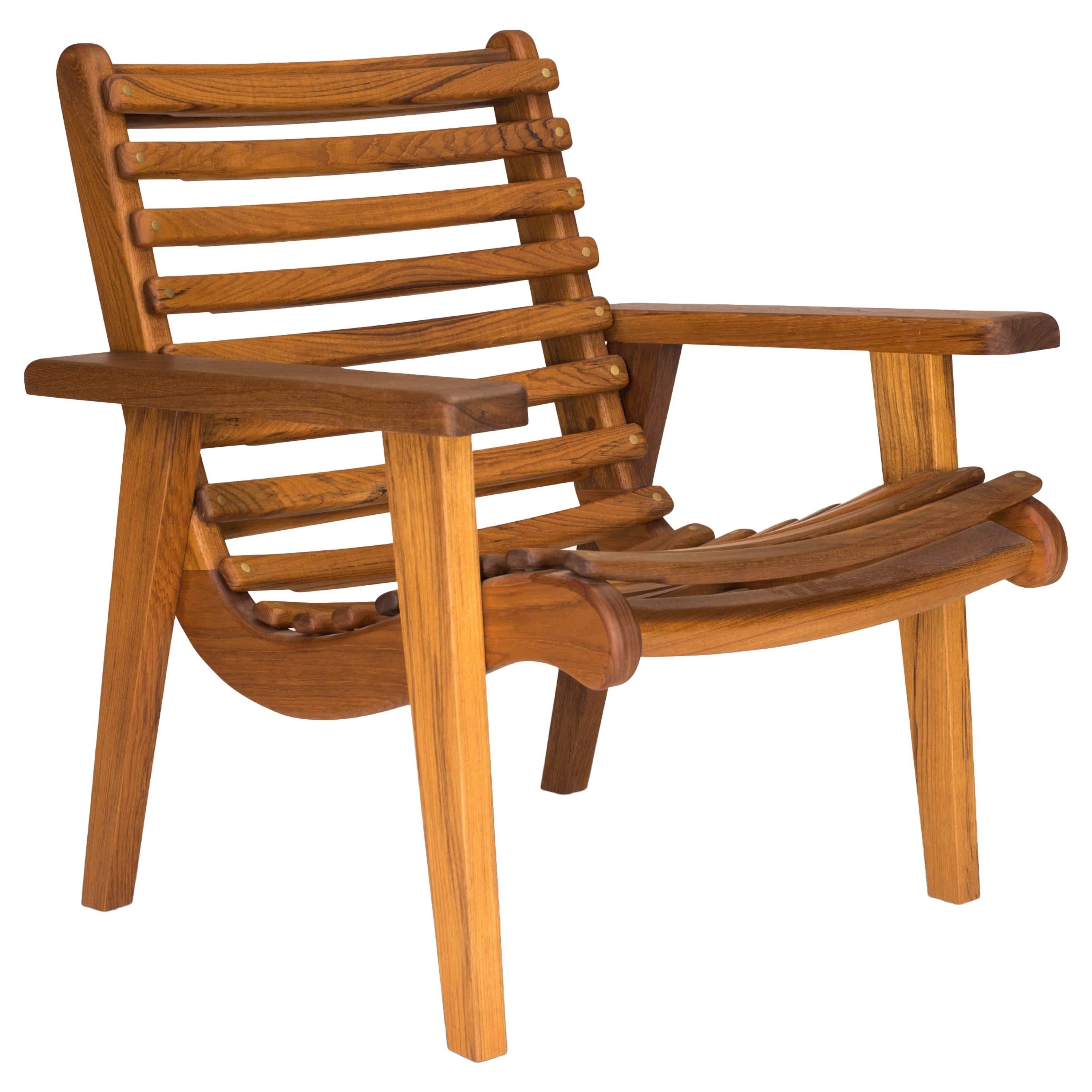 https://a.1stdibscdn.com/michael-van-bueren-modernist-armchair-in-teak-for-indooroutdoor-for-sale/archivesE/upload/366869/f_101691511521557666002/10169151_master.jpg