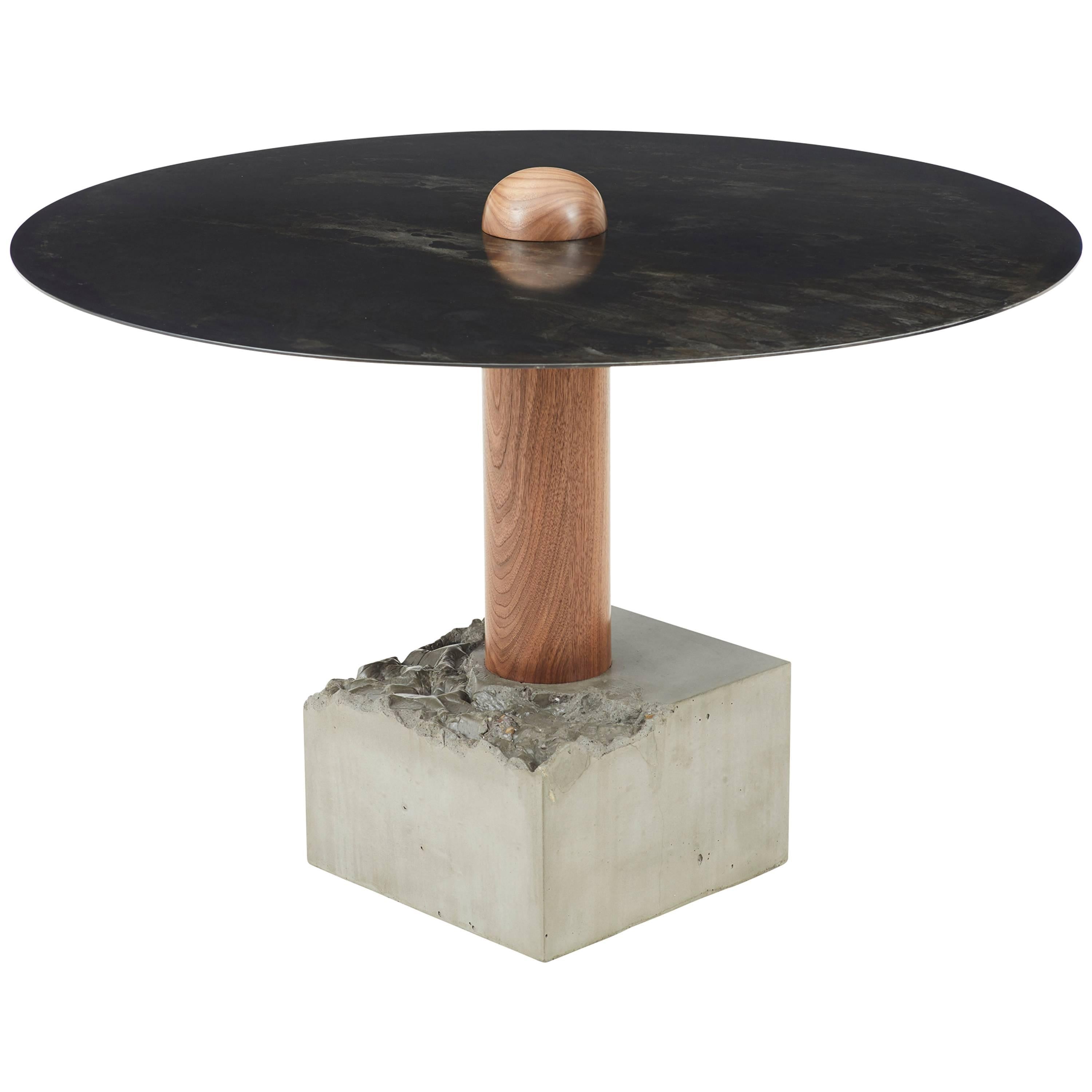 https://a.1stdibscdn.com/rt-1-round-dining-table-with-steel-top-solid-walnut-wood-post-and-concrete-base-for-sale/1121189/f_103621211522898456100/10362121_master.jpg