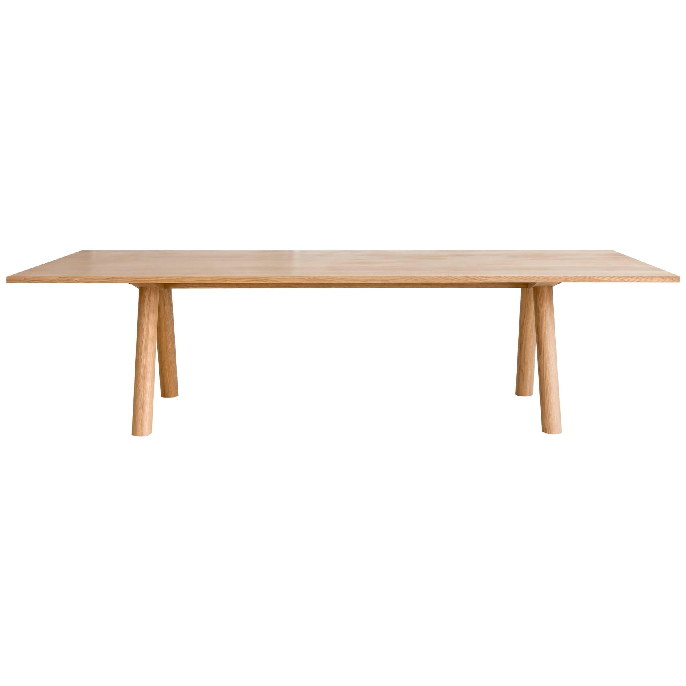 https://a.1stdibscdn.com/contemporary-wood-angled-leg-column-dining-table-in-white-oak-by-fort-standard-for-sale/1121189/f_105190131524907768008/10519013_master.jpg