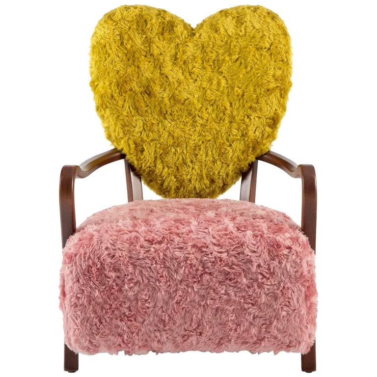 https://a.1stdibscdn.com/contemporary-uni-armchair-with-heart-shaped-back-and-pink-and-yellow-mohair-for-sale/1121189/f_106833311527921682645/10683331_master.jpg?width=768
