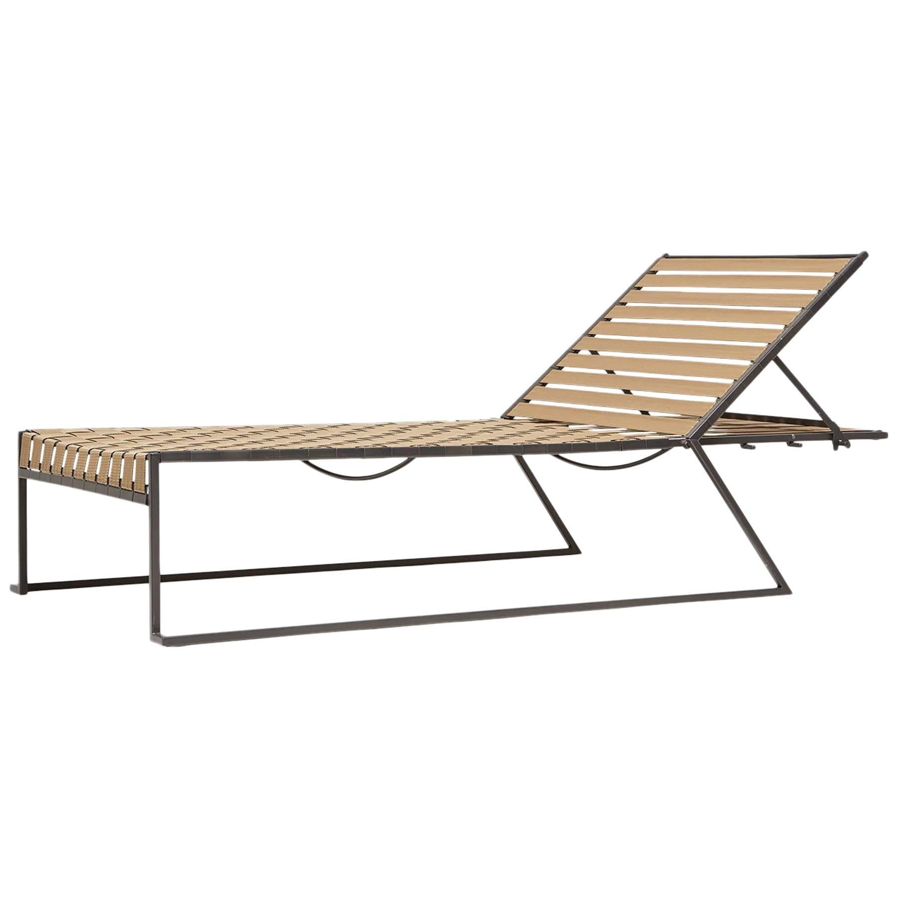 https://a.1stdibscdn.com/outdoor-tan-and-charcoal-pool-chaise-for-sale/1121189/f_107591311526122867015/10759131_master.jpg