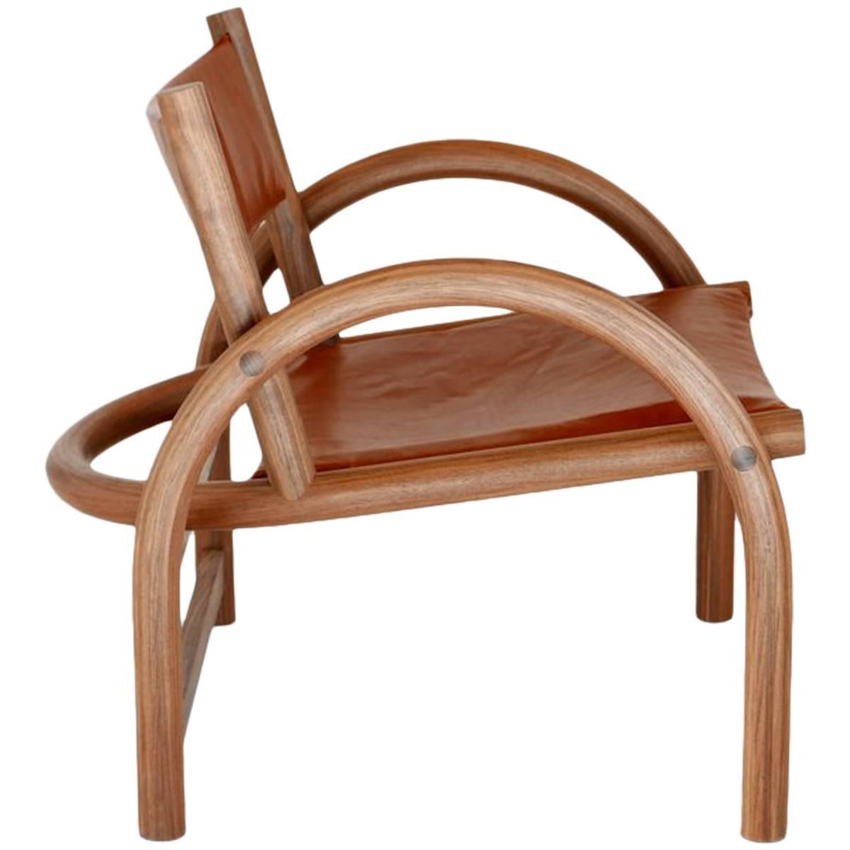 https://a.1stdibscdn.com/shepherds-chair-in-solid-bent-american-black-walnut-and-veg-tanned-leather-for-sale/1121189/f_108008531526619397380/10800853_master.jpg