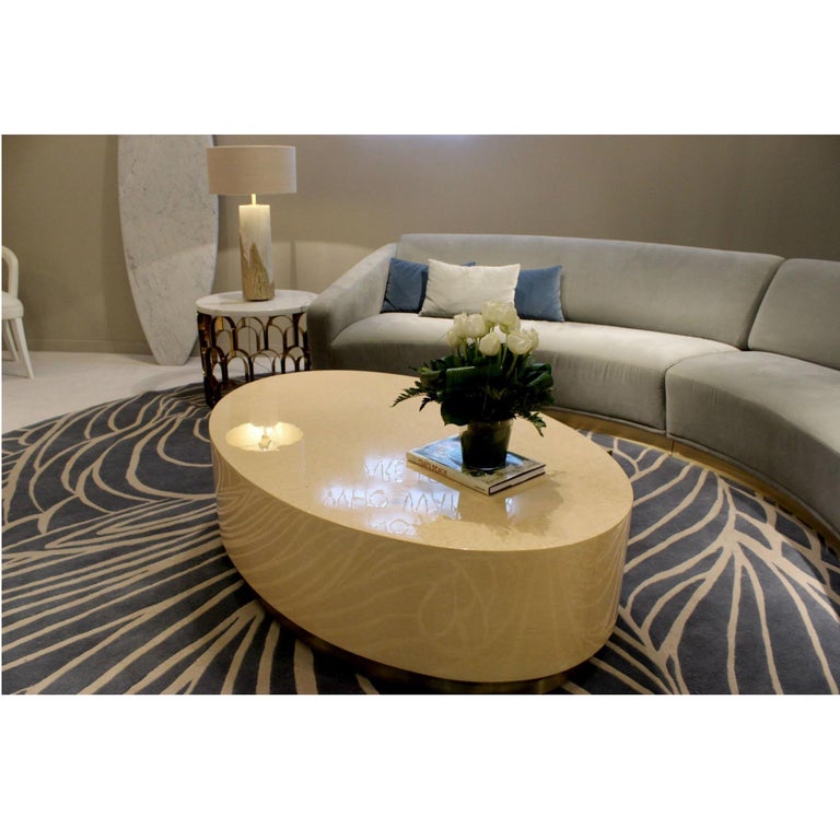 https://a.1stdibscdn.com/hand-tailored-curved-sofa-in-stylish-brushed-brass-plate-footer-for-sale-picture-8/f_27693/f_211238321677657855203/10818245_1072125832802650_7857719831818354301_o_master.jpg?width=768