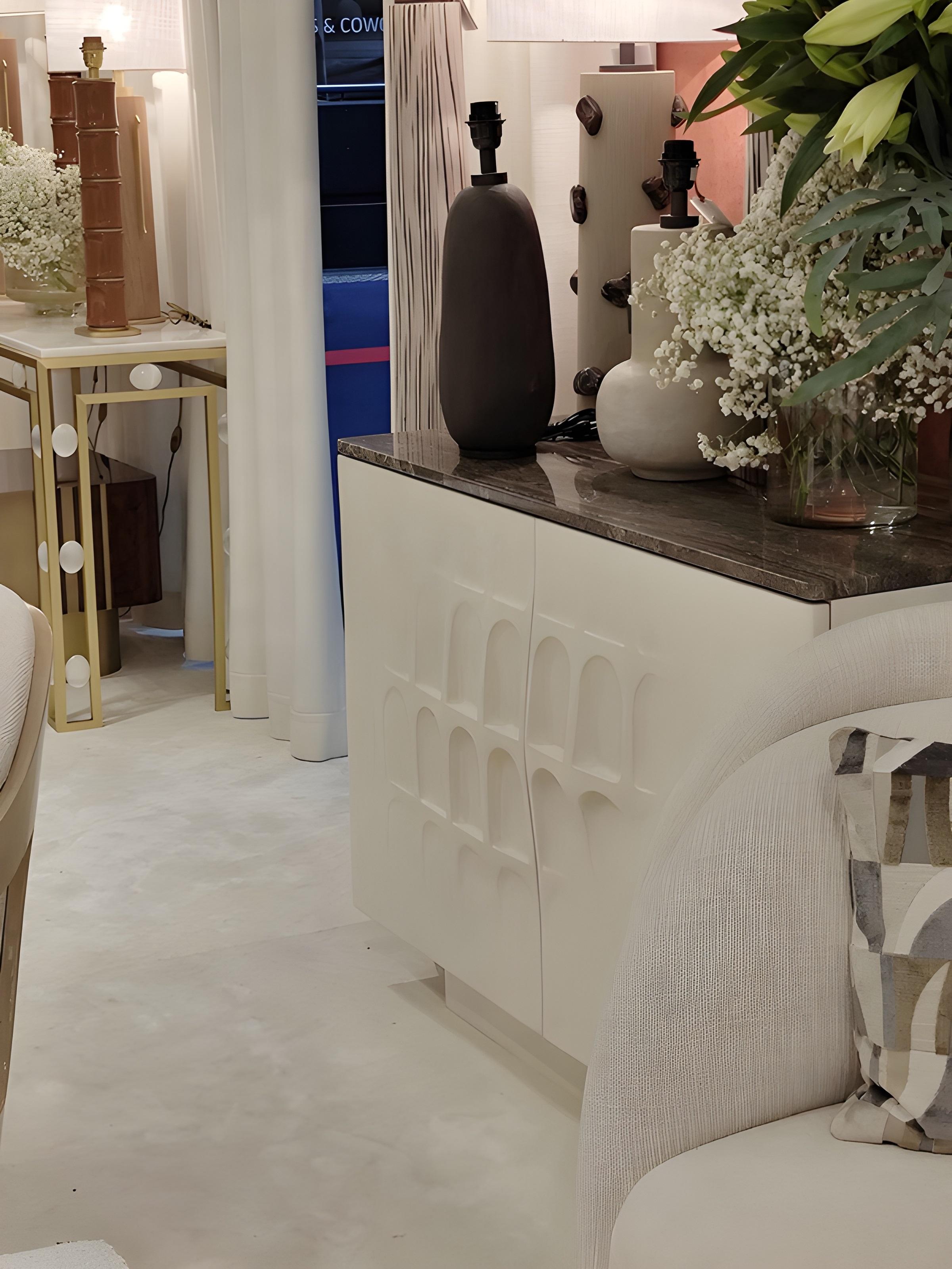 https://a.1stdibscdn.com/1980s-style-white-plastered-credenza-with-sculpted-arch-doors-by-jose-castro-for-sale-picture-7/f_27693/f_475543121763366781252/10_1_master.jpg
