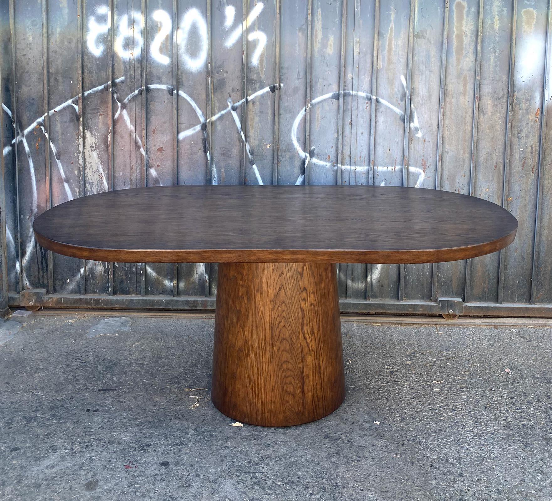 https://a.1stdibscdn.com/dos-gallos-custom-oak-oval-top-table-with-tapered-base-for-sale-picture-2/f_7978/f_404113621719781173817/10_32MAIN2_master.jpg