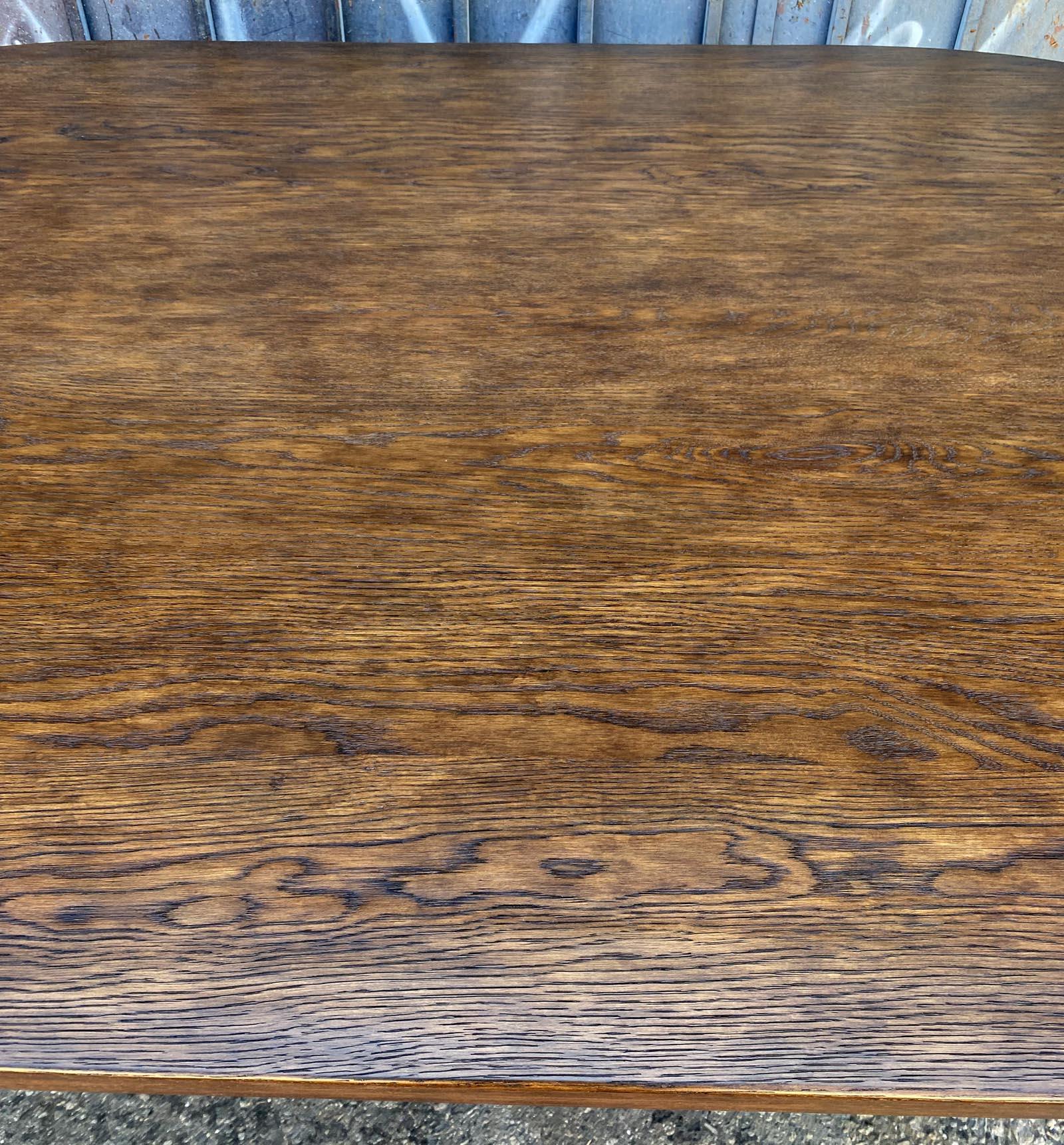 https://a.1stdibscdn.com/dos-gallos-custom-oak-oval-top-table-with-tapered-base-for-sale-picture-16/f_7978/f_404113621719781171244/10_32det5_master.jpg