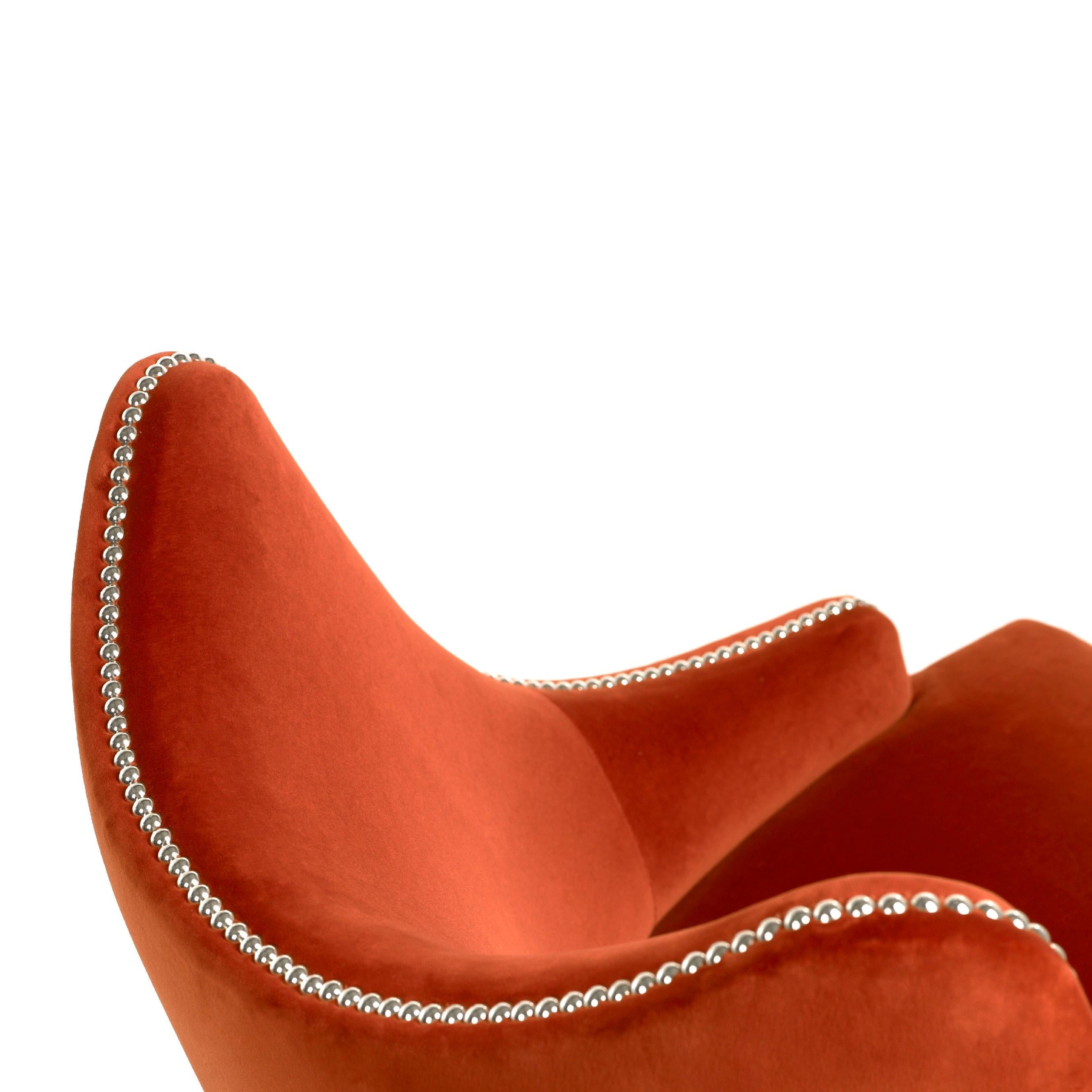 https://a.1stdibscdn.com/contemporary-velvet-armchair-offered-with-nails-on-the-curve-back-for-sale-picture-4/f_27693/f_330636121677748616364/110925_MUNNA_Becomes_me_armchair_tangerine_tango_1__master.jpg