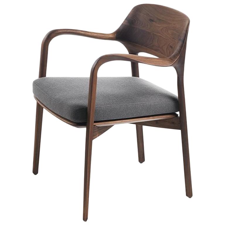 https://a.1stdibscdn.com/linea-armchair-in-solid-walnut-for-sale/1121189/f_112458131530351495943/11245813_master.jpg