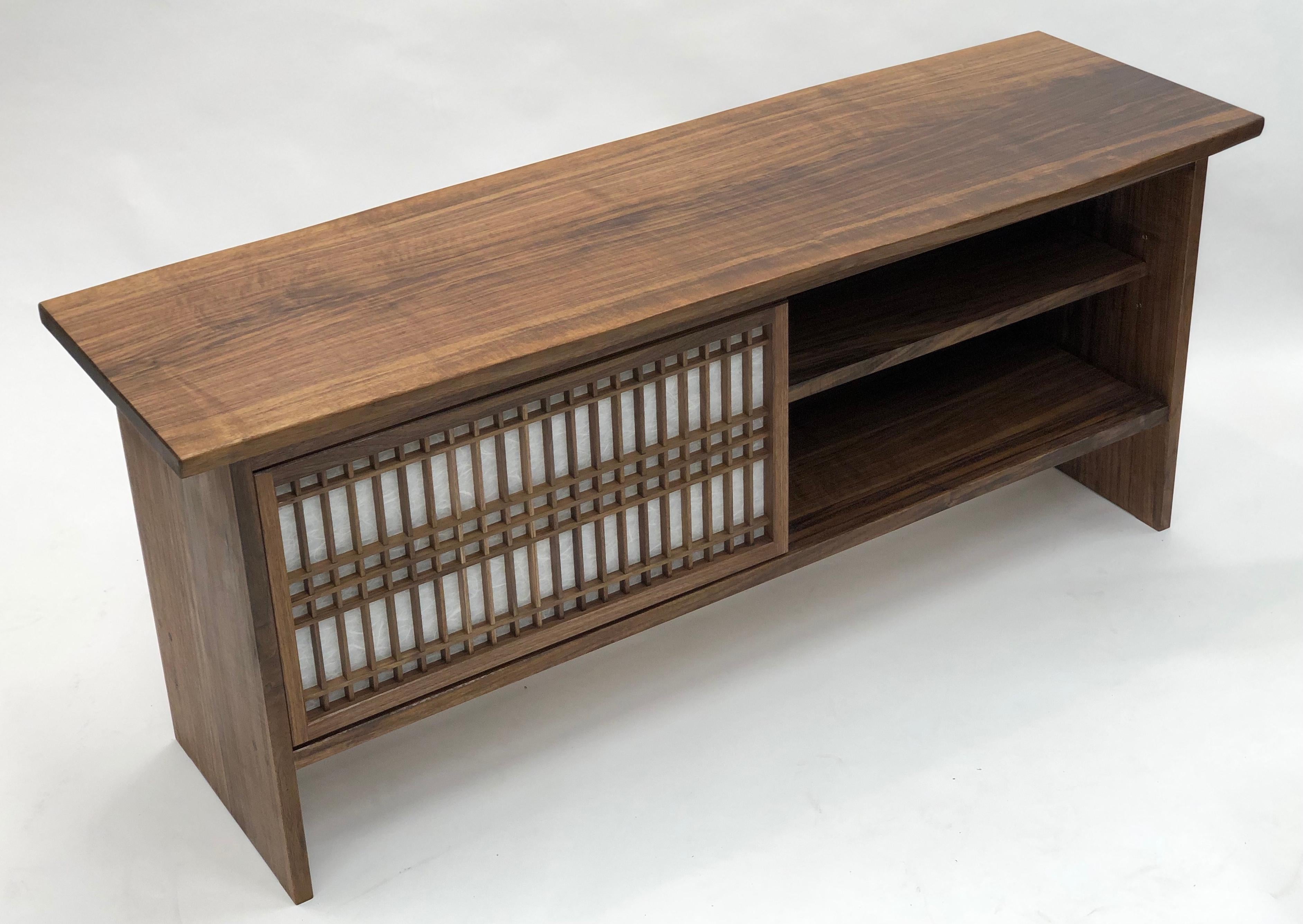 https://a.1stdibscdn.com/walnut-credenza-with-sliding-shoji-doors-for-sale-picture-2/f_45782/f_224459721612735491497/1168AEC4_5B8F_47C3_9A2E_886F61085F3E_master.jpeg