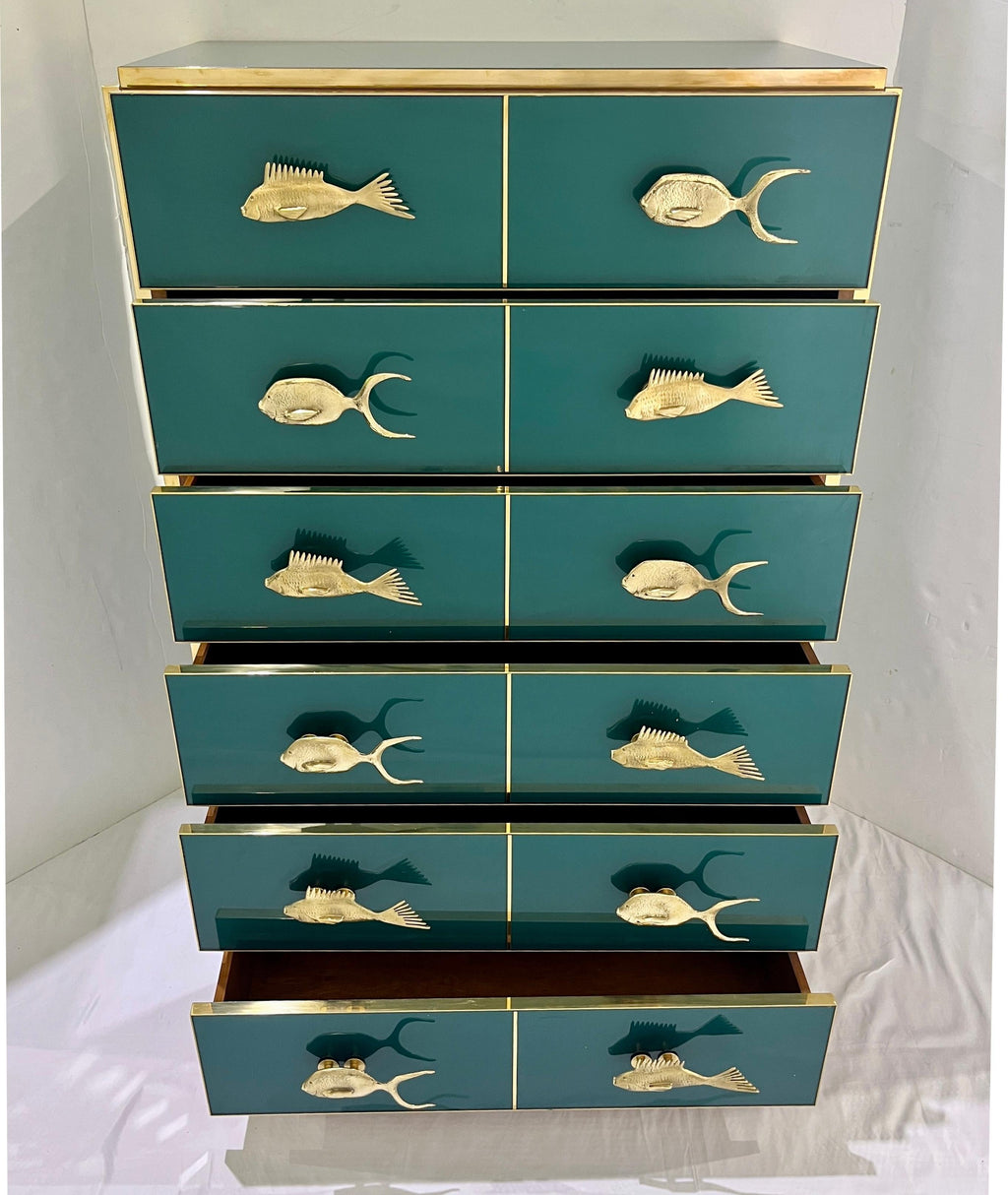 https://a.1stdibscdn.com/bespoke-italian-brass-emerald-blue-green-art-glass-6-drawer-highboy-dresser-for-sale-picture-2/f_54472/f_454558721749906443647/1169PA_2_master.jpg