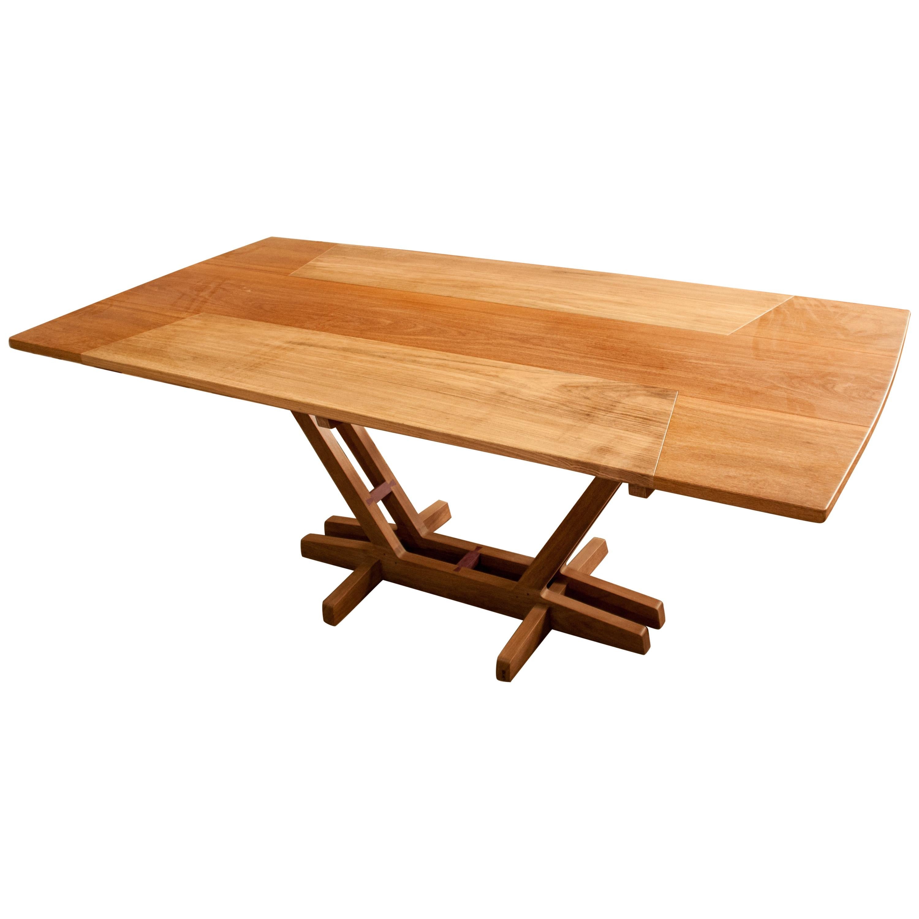 https://a.1stdibscdn.com/contemporary-dining-table-in-brazilian-hardwood-by-ricardo-graham-ferreira-for-sale/1121189/f_117658911534573978187/11765891_master.jpg