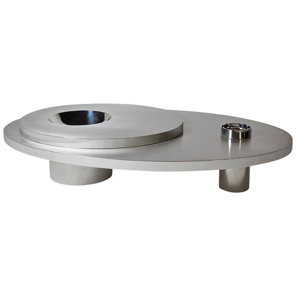 https://a.1stdibscdn.com/contemporary-futuristic-center-table-in-stainless-steel-for-sale/1121189/f_118309731536386651493/11830973_master.jpg