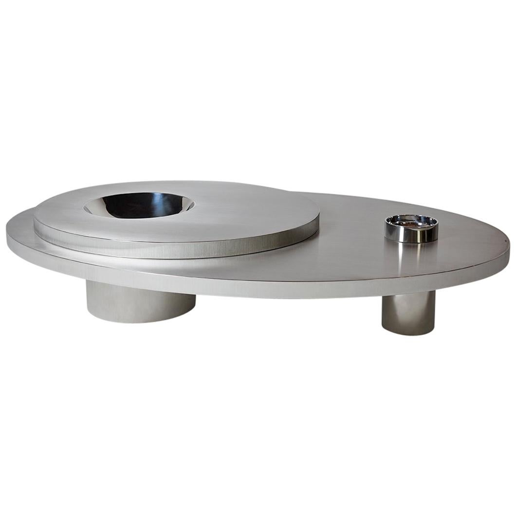 https://a.1stdibscdn.com/contemporary-futuristic-center-table-in-stainless-steel-for-sale/1121189/f_118309731536386651493/11830973_master.jpg
