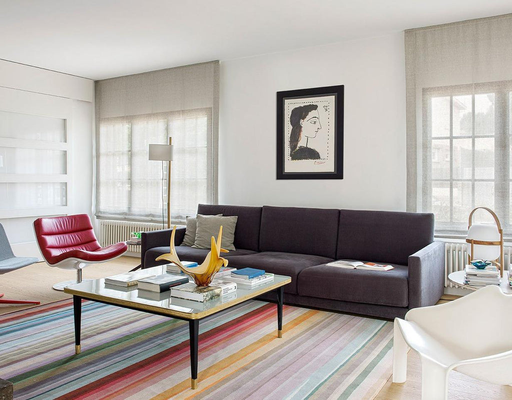https://a.1stdibscdn.com/low-table-high-gloss-top-brass-tape-framed-black-conical-legs-brass-end-large-for-sale-picture-2/f_40561/f_338704421681830963414/118_ST_MIQUEL_abrilsstudio_annaalegre_04_2_master.jpg
