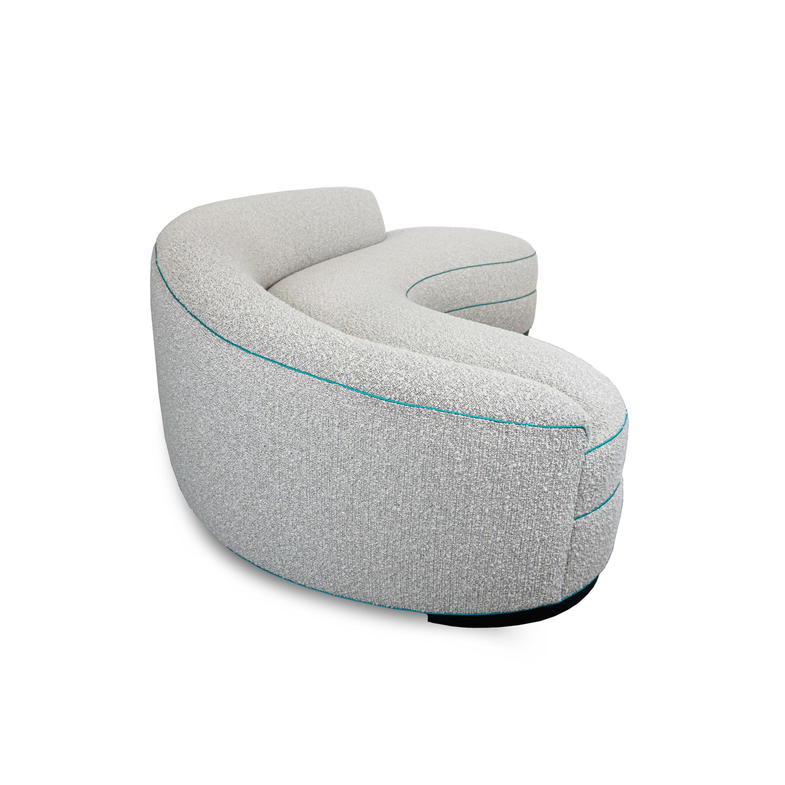 https://a.1stdibscdn.com/boucle-curved-sofa-with-turquoise-accents-for-sale-picture-7/f_21233/1622750904513/11_master.jpg