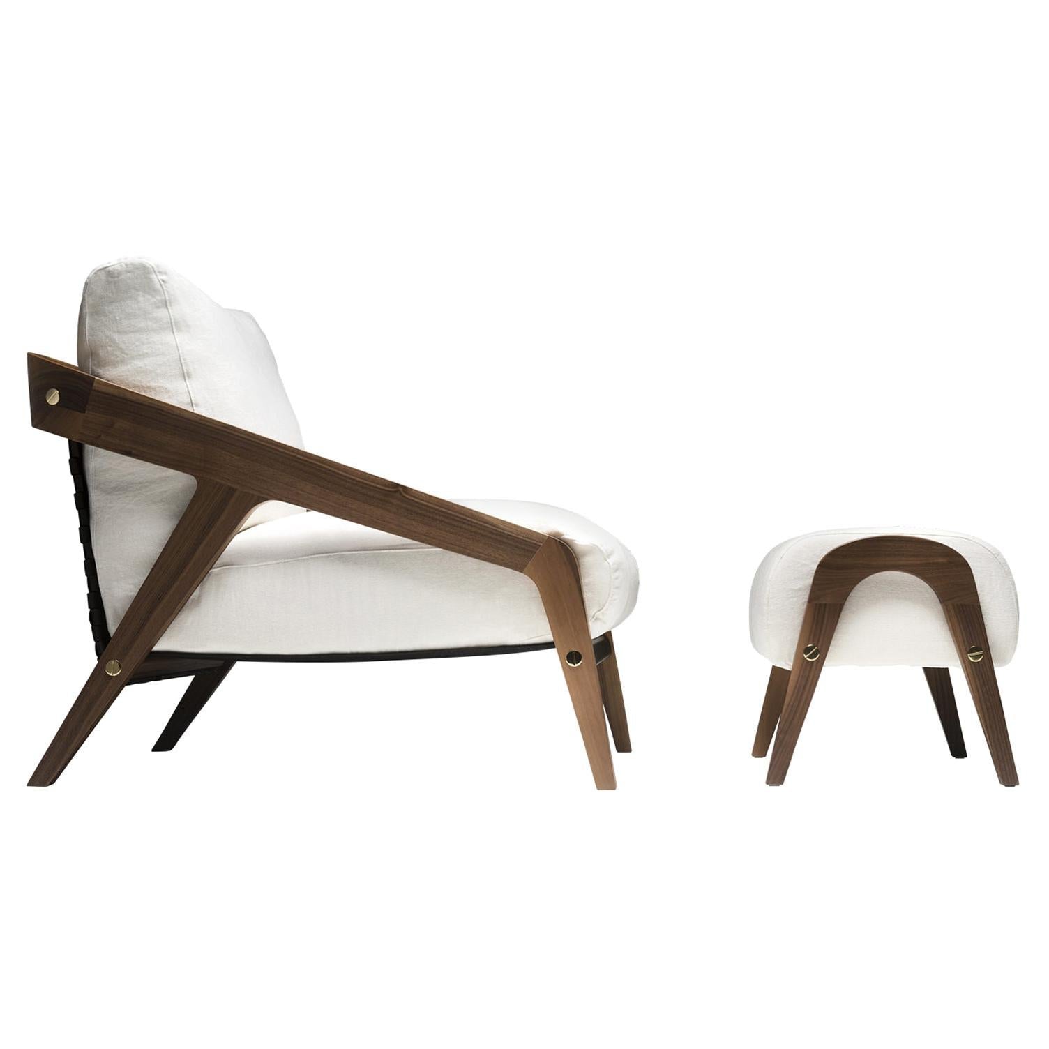 https://a.1stdibscdn.com/frise-set-of-white-armchair-and-ottoman-for-sale/1121189/f_120314231683377411116/12031423_datamatics.jpg