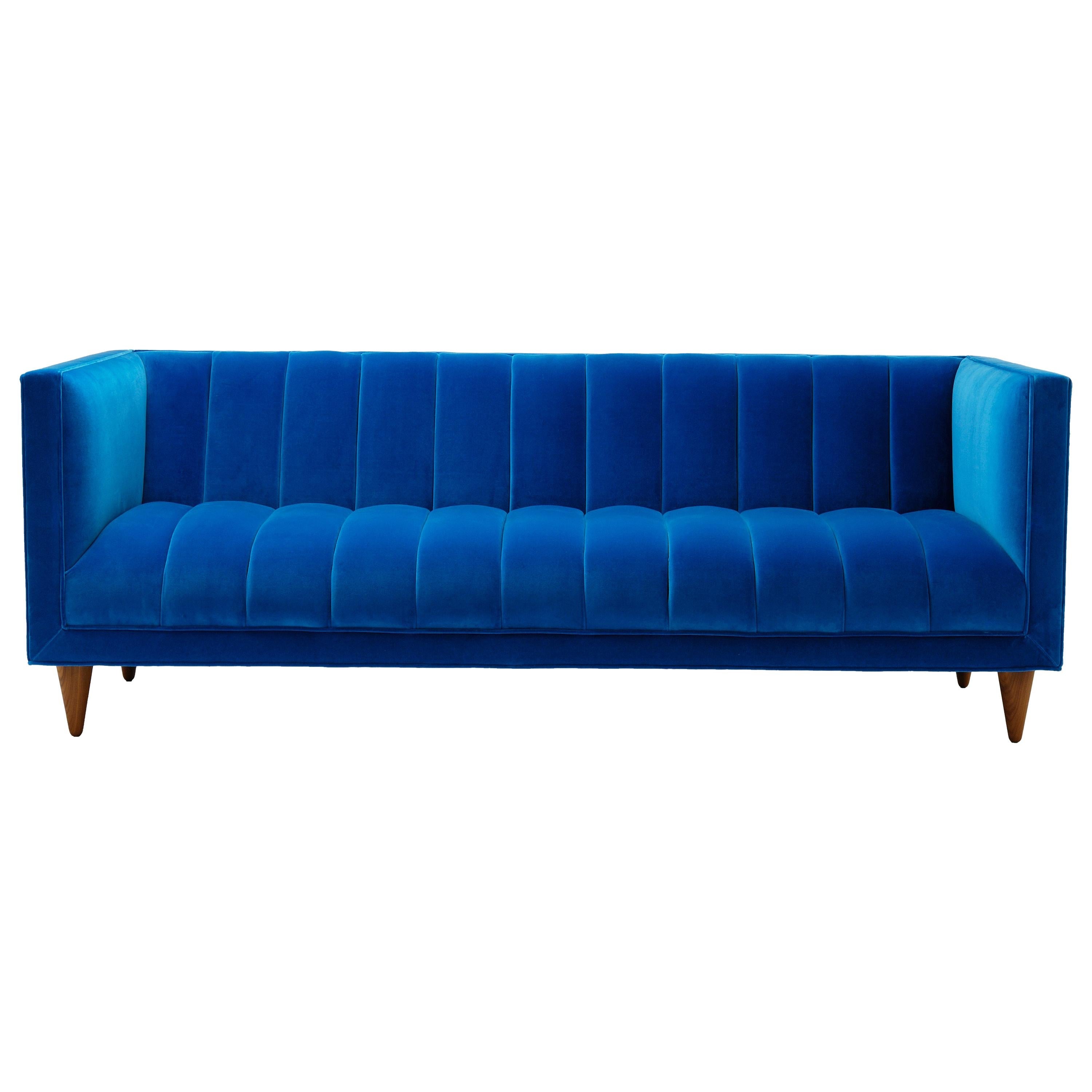 https://a.1stdibscdn.com/contemporary-fleure-sofa-in-teal-blue-velvet-with-walnut-legs-for-sale/1121189/f_127855021543026181676/12785502_master.jpg